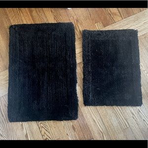 Set of 2, brand new, never used, black bath rugs.